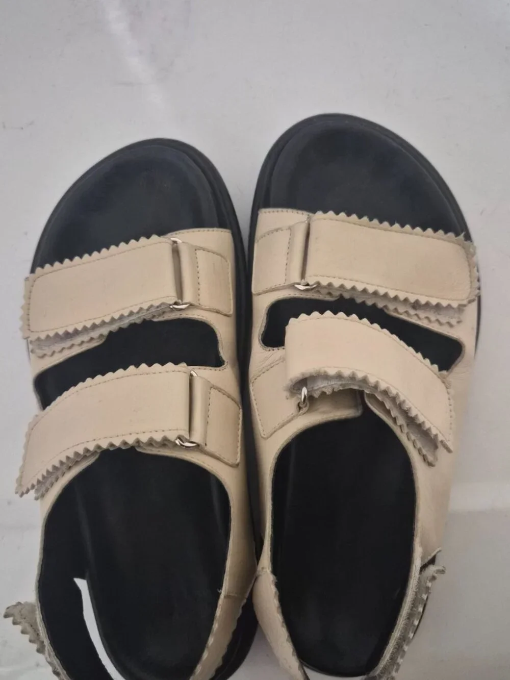 Maguire Cream and Black Minimalist Sandals with Two-Strap Design